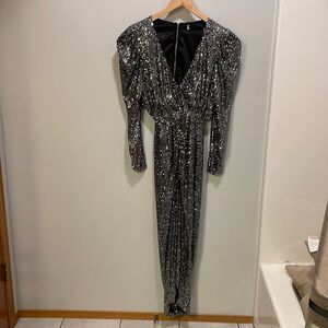 WOMAN’S silver sequin dress